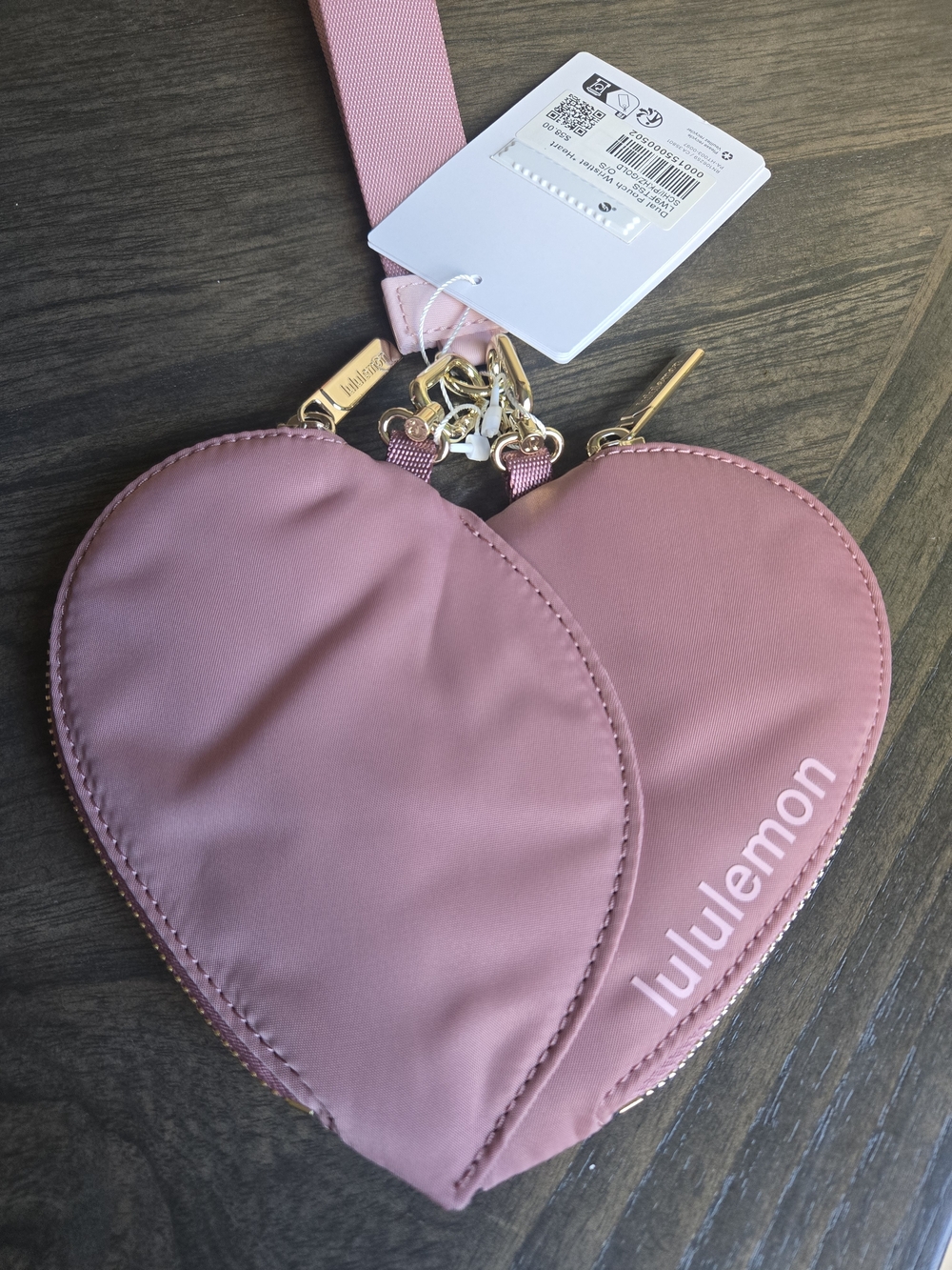lululemon pink heart wristlet with gold hardware